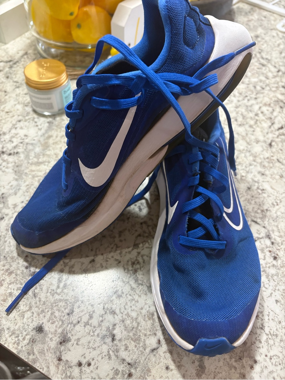 Nike Men’s Blue Running Sneakers with White Swoosh